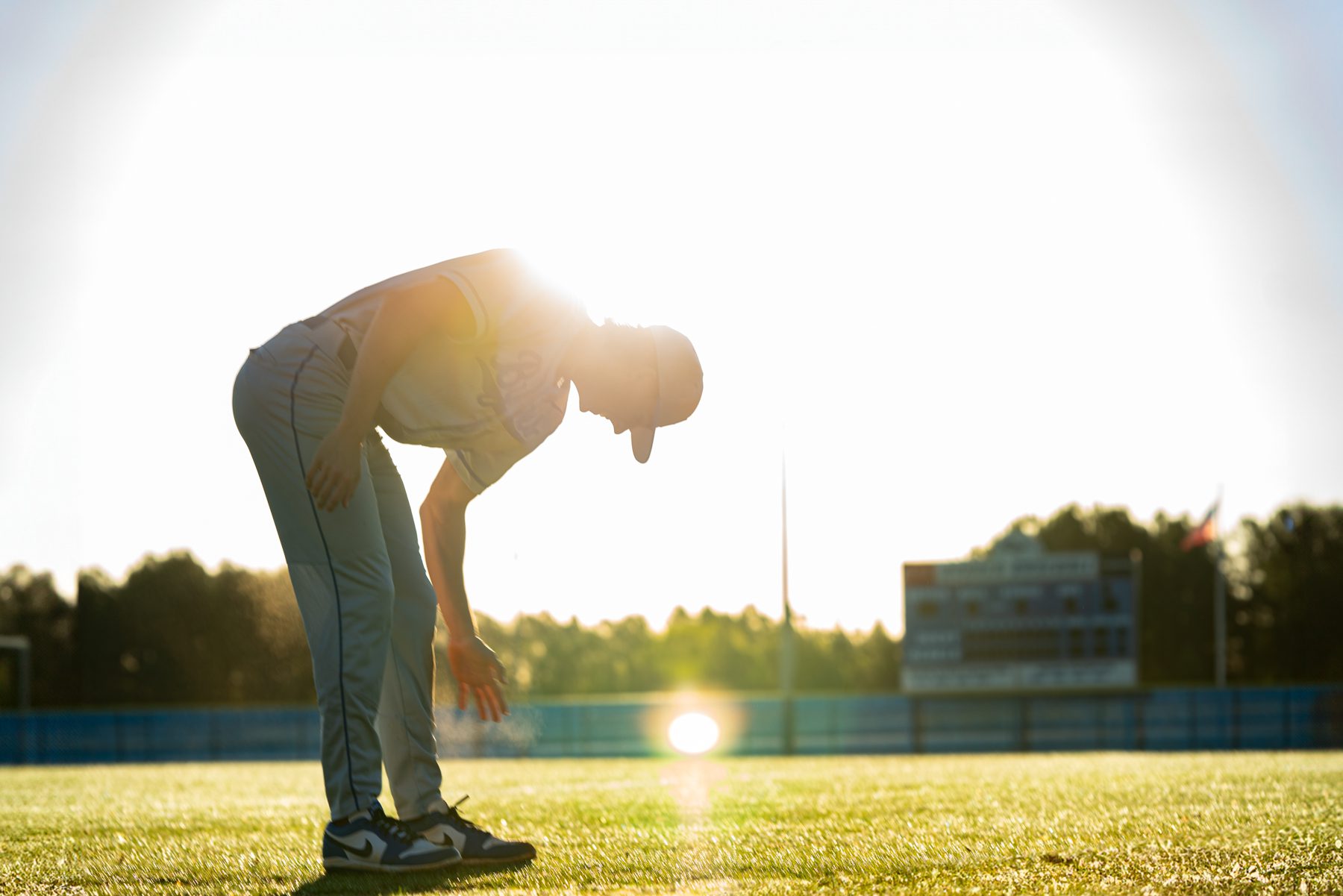 Creative Baseball player Byrnes High School senior photo session with Taylor Johnson photography