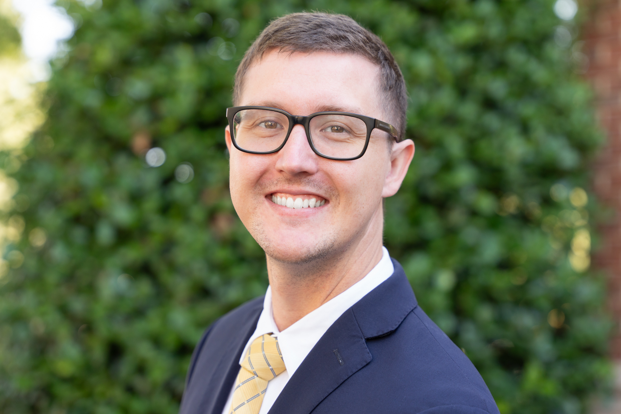Merline and Meecham attorney poses for headshot in Greenville, SC taken by Taylor Johnson Photography