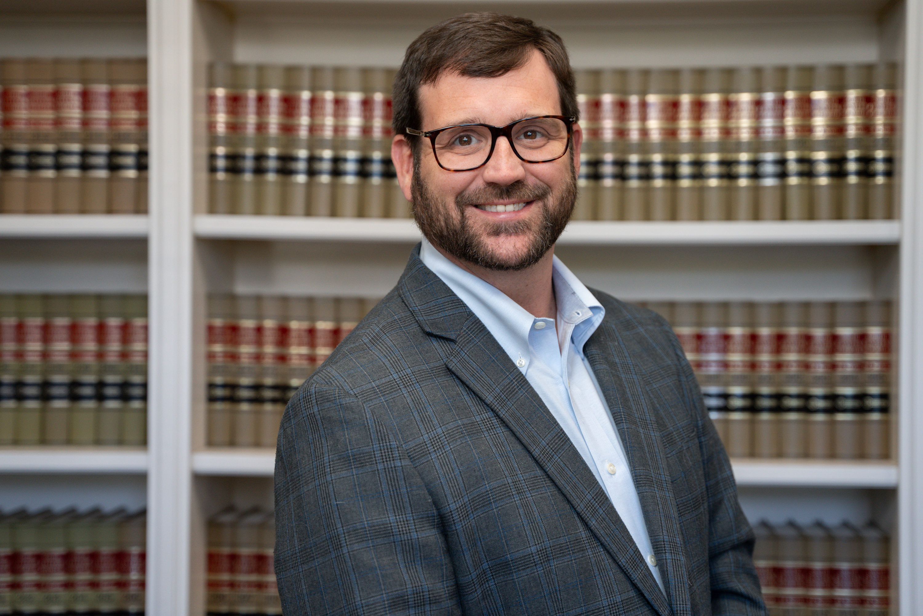 Patrick Dollar poses for headshot at Bixlar and Dollar Law Firm in Mauldin, South Carolina taken by professional photographer, Taylor Johnson